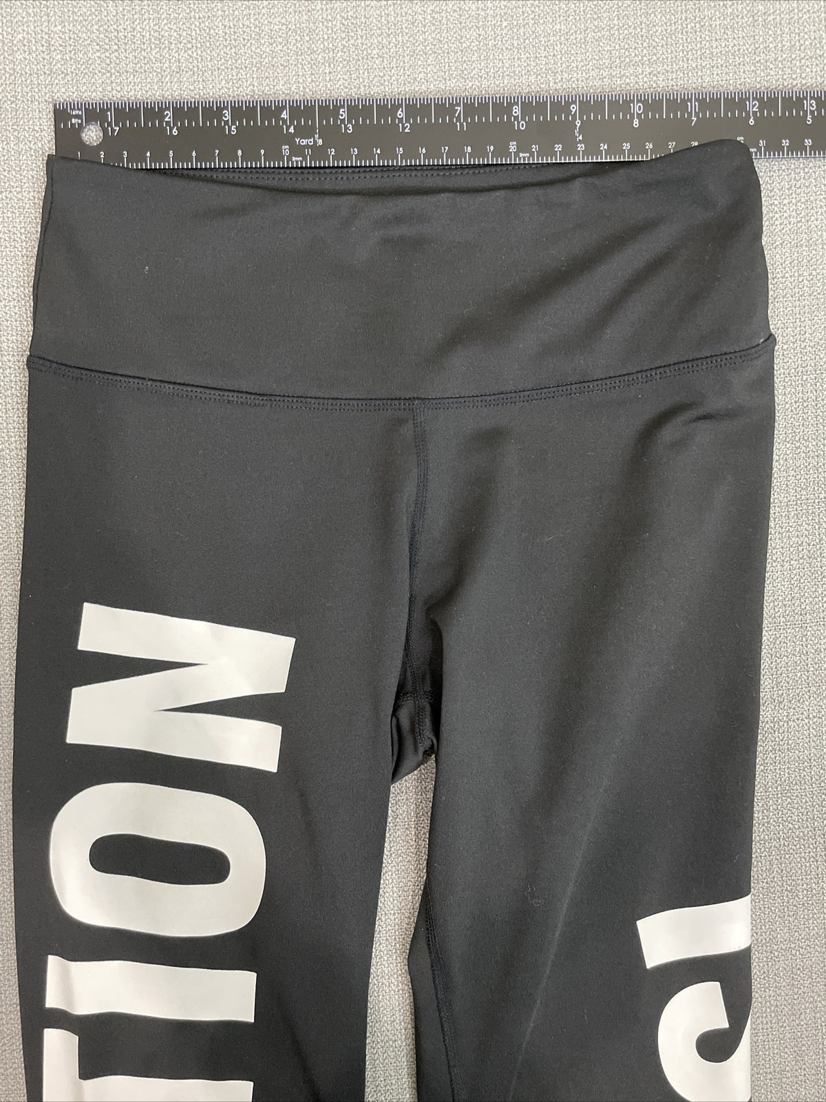 H&M Sport Women’s Black Pull On "Motivation Is The Key" Wording Leggings Size S