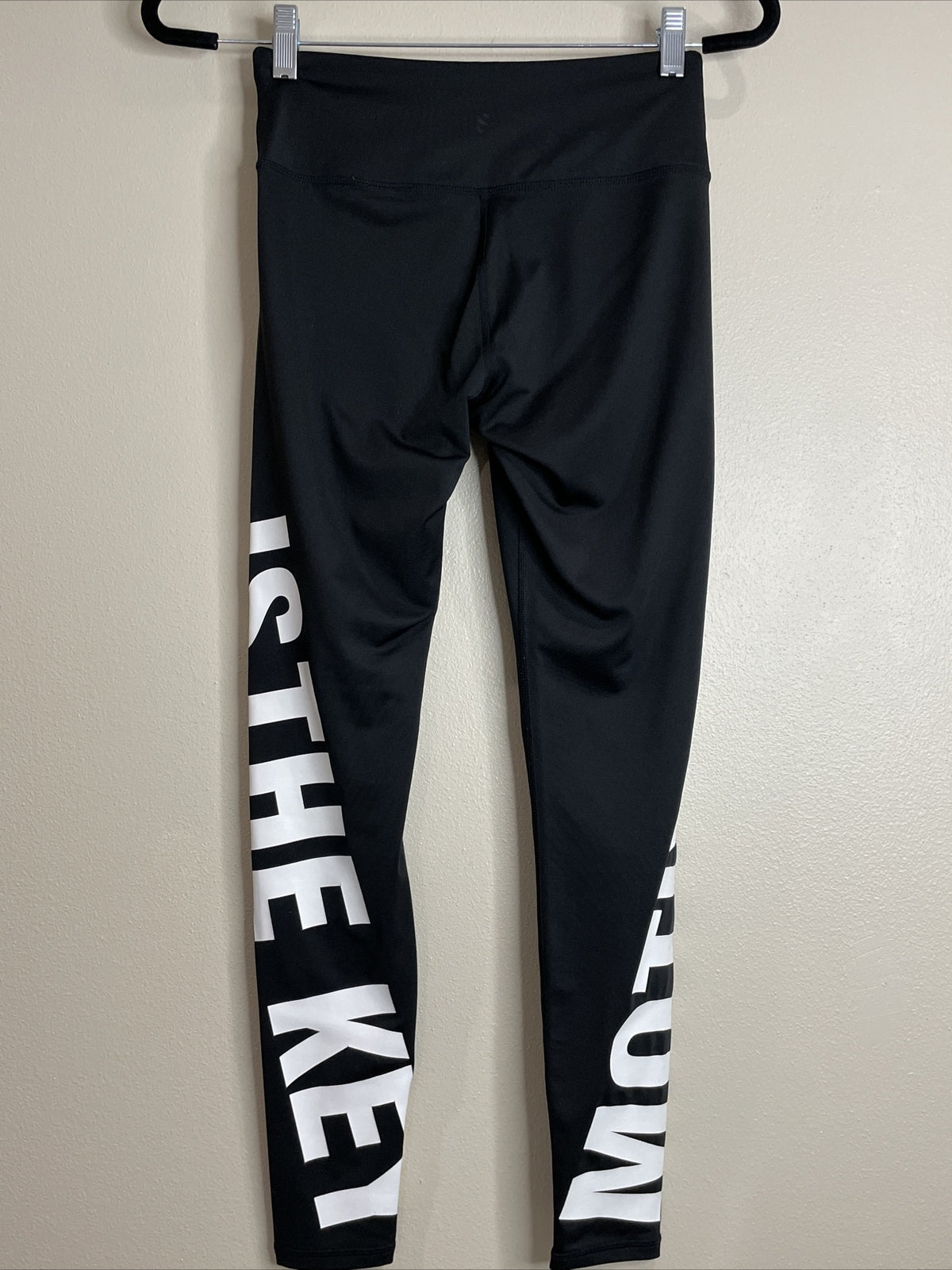 H&M Sport Women’s Black Pull On "Motivation Is The Key" Wording Leggings Size S